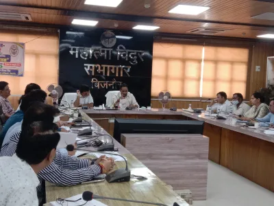 DM Umesh Pratap Singh chairing a review meeting on Viksit Bharat Yojana in Bijnor
