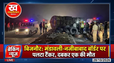 Police at the accident site in Bijnor where a heavy tanker overturned on Kotdwar road