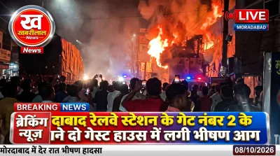 Firefighters extinguishing massive fire at a guest house near Moradabad Railway Station